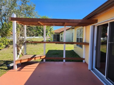 BEAUTIFUL LAKE VIEWS AND FLORIDA CHARM!This wonderful home on Duffys Golf Center in Florida - for sale on GolfHomes.com, golf home, golf lot