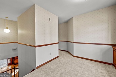 Tucked into the heart of Peachtree City, this home has been on Canongate At Flat Creek Club in Georgia - for sale on GolfHomes.com, golf home, golf lot