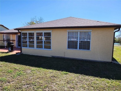 BEAUTIFUL LAKE VIEWS AND FLORIDA CHARM!This wonderful home on Duffys Golf Center in Florida - for sale on GolfHomes.com, golf home, golf lot
