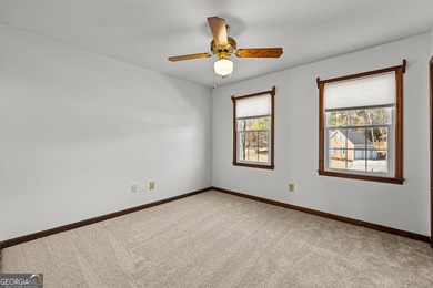 Tucked into the heart of Peachtree City, this home has been on Canongate At Flat Creek Club in Georgia - for sale on GolfHomes.com, golf home, golf lot