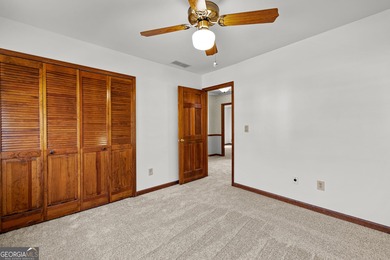 Tucked into the heart of Peachtree City, this home has been on Canongate At Flat Creek Club in Georgia - for sale on GolfHomes.com, golf home, golf lot