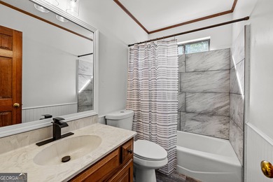 Tucked into the heart of Peachtree City, this home has been on Canongate At Flat Creek Club in Georgia - for sale on GolfHomes.com, golf home, golf lot