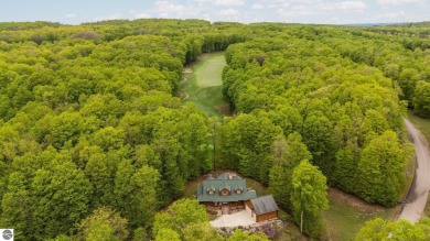 Stunning, custom-built log home overlooking the 16th tee & on Cedar River Golf Course in Michigan - for sale on GolfHomes.com, golf home, golf lot