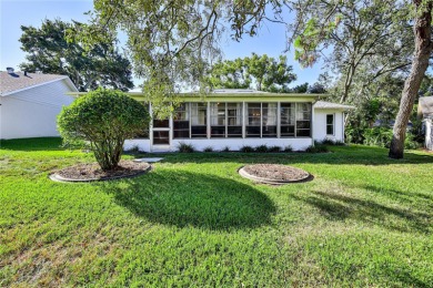 Welcome to this charming 2-bedroom, 2-bathroom home with a 2-car on Timber Pines Golf Course in Florida - for sale on GolfHomes.com, golf home, golf lot