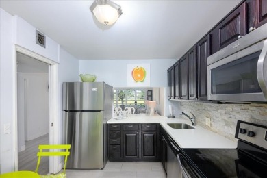 Gorgeous 3-Bedroom Corner Unit in Palm Aire Country Club on Palm-Aire Country Club and Resort - Palms in Florida - for sale on GolfHomes.com, golf home, golf lot