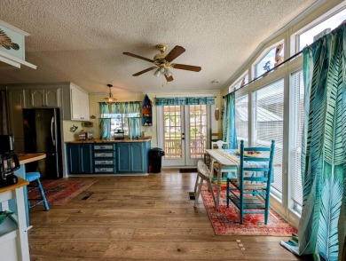 This captivating home in River Vista 55+ community offers the on The Riverside Golf Club in Florida - for sale on GolfHomes.com, golf home, golf lot