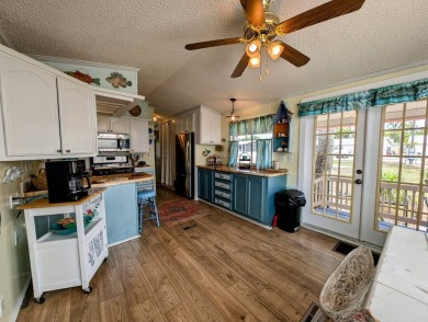 This captivating home in River Vista 55+ community offers the on The Riverside Golf Club in Florida - for sale on GolfHomes.com, golf home, golf lot