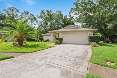 Tucked away at the end of a peaceful cul-de-sac in the highly on Highland Lakes Executive Golf Course in Florida - for sale on GolfHomes.com, golf home, golf lot