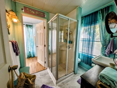 This captivating home in River Vista 55+ community offers the on The Riverside Golf Club in Florida - for sale on GolfHomes.com, golf home, golf lot