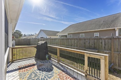 Charming 4-Bedroom Home with Solar Power on a Corner Lot in on Magnolia Greens Golf Plantation in North Carolina - for sale on GolfHomes.com, golf home, golf lot