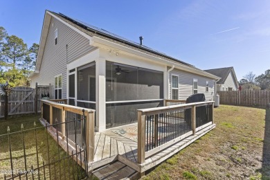 Charming 4-Bedroom Home with Solar Power on a Corner Lot in on Magnolia Greens Golf Plantation in North Carolina - for sale on GolfHomes.com, golf home, golf lot