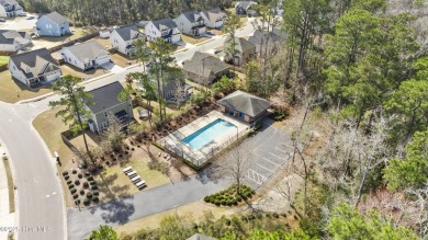 Charming 4-Bedroom Home with Solar Power on a Corner Lot in on Magnolia Greens Golf Plantation in North Carolina - for sale on GolfHomes.com, golf home, golf lot