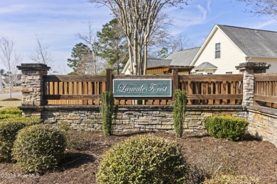 Charming 4-Bedroom Home with Solar Power on a Corner Lot in on Magnolia Greens Golf Plantation in North Carolina - for sale on GolfHomes.com, golf home, golf lot