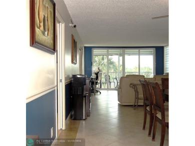 Your dream home with sweeping golf course and pond views! This on Palm-Aire Country Club and Resort - The Oaks in Florida - for sale on GolfHomes.com, golf home, golf lot