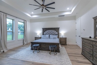 Modern Comfort Near the Green! Mt. Pleasant Country Club Estates on Mount Pleasant Country Club in Texas - for sale on GolfHomes.com, golf home, golf lot