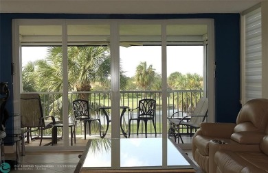 Your dream home with sweeping golf course and pond views! This on Palm-Aire Country Club and Resort - The Oaks in Florida - for sale on GolfHomes.com, golf home, golf lot