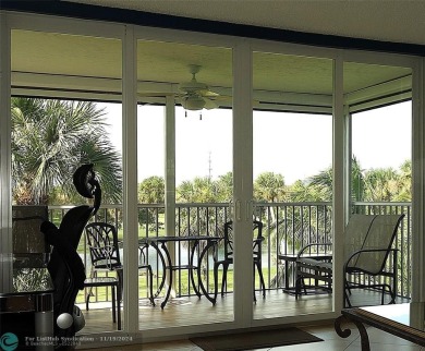 Your dream home with sweeping golf course and pond views! This on Palm-Aire Country Club and Resort - The Oaks in Florida - for sale on GolfHomes.com, golf home, golf lot