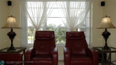 Your dream home with sweeping golf course and pond views! This on Palm-Aire Country Club and Resort - The Oaks in Florida - for sale on GolfHomes.com, golf home, golf lot