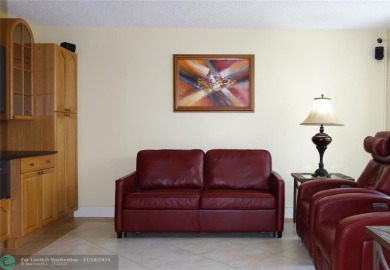 Your dream home with sweeping golf course and pond views! This on Palm-Aire Country Club and Resort - The Oaks in Florida - for sale on GolfHomes.com, golf home, golf lot