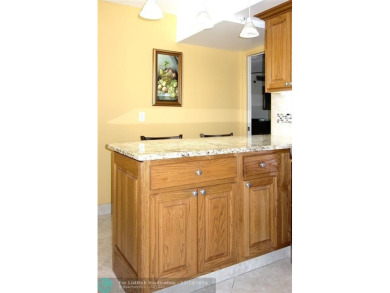 Your dream home with sweeping golf course and pond views! This on Palm-Aire Country Club and Resort - The Oaks in Florida - for sale on GolfHomes.com, golf home, golf lot