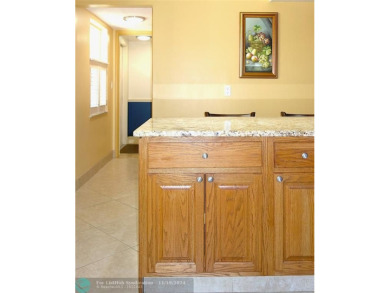 Your dream home with sweeping golf course and pond views! This on Palm-Aire Country Club and Resort - The Oaks in Florida - for sale on GolfHomes.com, golf home, golf lot