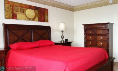 Your dream home with sweeping golf course and pond views! This on Palm-Aire Country Club and Resort - The Oaks in Florida - for sale on GolfHomes.com, golf home, golf lot