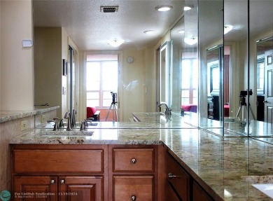 Your dream home with sweeping golf course and pond views! This on Palm-Aire Country Club and Resort - The Oaks in Florida - for sale on GolfHomes.com, golf home, golf lot