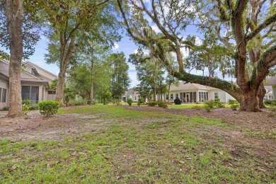 Experience Lowcountry living in this spacious 3-bedroom, 3-bath on Pawleys Plantation Golf and Country Club in South Carolina - for sale on GolfHomes.com, golf home, golf lot