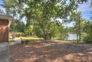 Discover this exceptional five-bedroom home featuring spacious on West Lake Country Club in Georgia - for sale on GolfHomes.com, golf home, golf lot