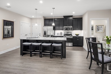 Welcome to Potomac Shores! One-level elevator condos in on Potomac Shores Golf Club in Virginia - for sale on GolfHomes.com, golf home, golf lot