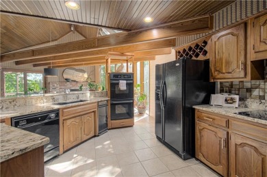 Fabulous One Owner Custom Home on Stunning 1.61 acre PRIVATE on Lake Quivira Country Club in Kansas - for sale on GolfHomes.com, golf home, golf lot