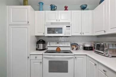 Don't miss out on this lovely home in the heart of Plantation on Plantation Bay Golf and Country Club in Florida - for sale on GolfHomes.com, golf home, golf lot