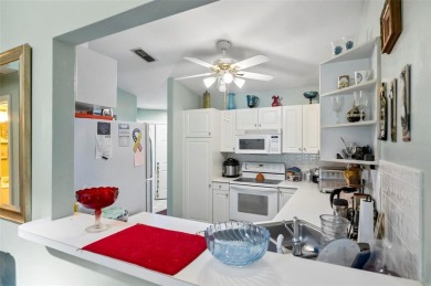 Don't miss out on this lovely home in the heart of Plantation on Plantation Bay Golf and Country Club in Florida - for sale on GolfHomes.com, golf home, golf lot