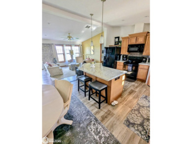 Discover a lifestyle of comfort and tranquility in this on Crestwood Hills Golf Course in Iowa - for sale on GolfHomes.com, golf home, golf lot