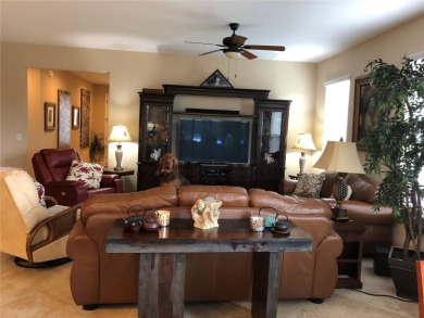 This home has been looked after well and it shows. The house on Trilogy at Ocala Preserve in Florida - for sale on GolfHomes.com, golf home, golf lot