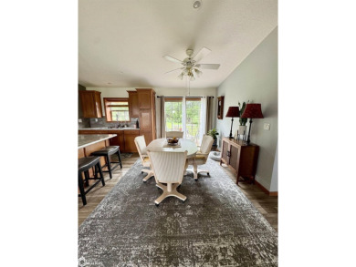 Discover a lifestyle of comfort and tranquility in this on Crestwood Hills Golf Course in Iowa - for sale on GolfHomes.com, golf home, golf lot