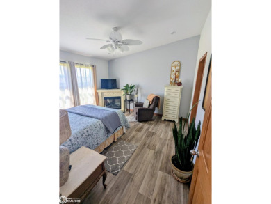 Discover a lifestyle of comfort and tranquility in this on Crestwood Hills Golf Course in Iowa - for sale on GolfHomes.com, golf home, golf lot
