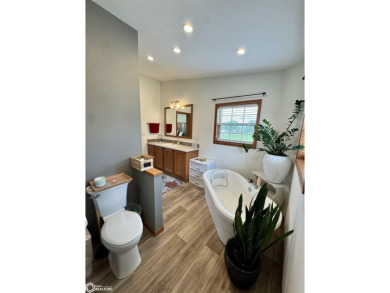 Discover a lifestyle of comfort and tranquility in this on Crestwood Hills Golf Course in Iowa - for sale on GolfHomes.com, golf home, golf lot