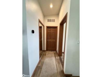 Discover a lifestyle of comfort and tranquility in this on Crestwood Hills Golf Course in Iowa - for sale on GolfHomes.com, golf home, golf lot