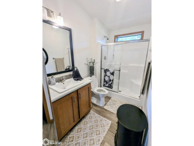 Discover a lifestyle of comfort and tranquility in this on Crestwood Hills Golf Course in Iowa - for sale on GolfHomes.com, golf home, golf lot