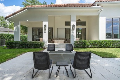 Experience luxury living in this stunning, modern estate on Isleworth Golf and Country Club in Florida - for sale on GolfHomes.com, golf home, golf lot