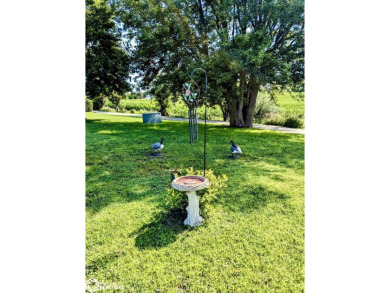Discover a lifestyle of comfort and tranquility in this on Crestwood Hills Golf Course in Iowa - for sale on GolfHomes.com, golf home, golf lot