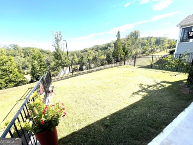 Gorgeous breathtaking scenery from your cozy covered back patio on Chateau Elan Golf Club  in Georgia - for sale on GolfHomes.com, golf home, golf lot