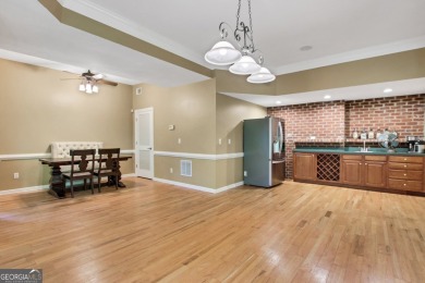 Discover an incredible opportunity in the highly sought-after on Sugar Hill Golf Club in Georgia - for sale on GolfHomes.com, golf home, golf lot