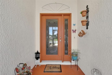 Step into easy Florida living with this well-maintained Squire on Monarch At Royal Highlands in Florida - for sale on GolfHomes.com, golf home, golf lot