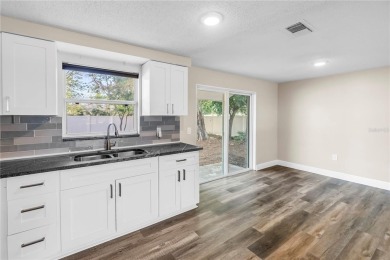 Located in a prime Northeast St. Petersburg neighborhood, this on Mangrove Bay Golf Course in Florida - for sale on GolfHomes.com, golf home, golf lot