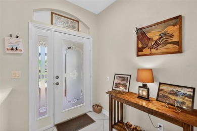 Step into easy Florida living with this well-maintained Squire on Monarch At Royal Highlands in Florida - for sale on GolfHomes.com, golf home, golf lot