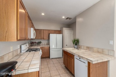 Move-in ready home in the Augusta Ranch golf course community! on Augusta Ranch Golf Club in Arizona - for sale on GolfHomes.com, golf home, golf lot