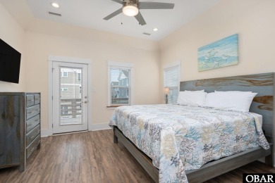 This turnkey 5-bedroom, 3.5-bath home is in the community of on The Currituck Golf Club in North Carolina - for sale on GolfHomes.com, golf home, golf lot