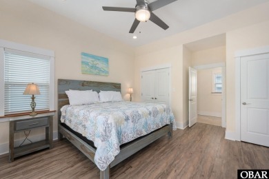 This turnkey 5-bedroom, 3.5-bath home is in the community of on The Currituck Golf Club in North Carolina - for sale on GolfHomes.com, golf home, golf lot